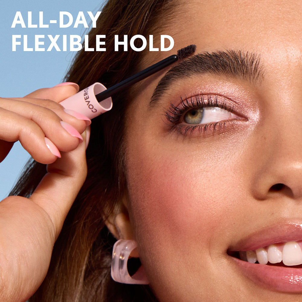 Model applying COVERGIRL Clean Fresh Brow Enhancer Gel Wax for all-day flexible hold.