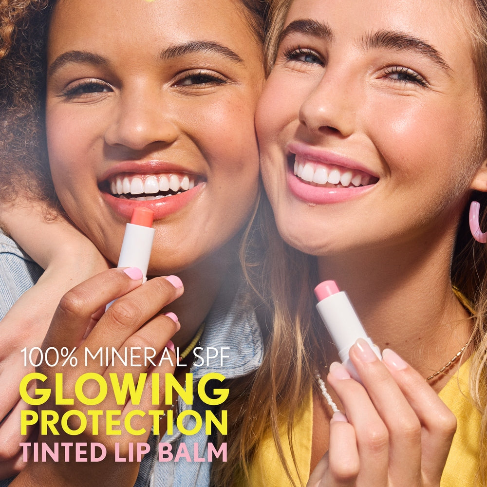 Model applying Clean Fresh Tinted Lip Balm SPF 15 in shade You Make Me Blush.
