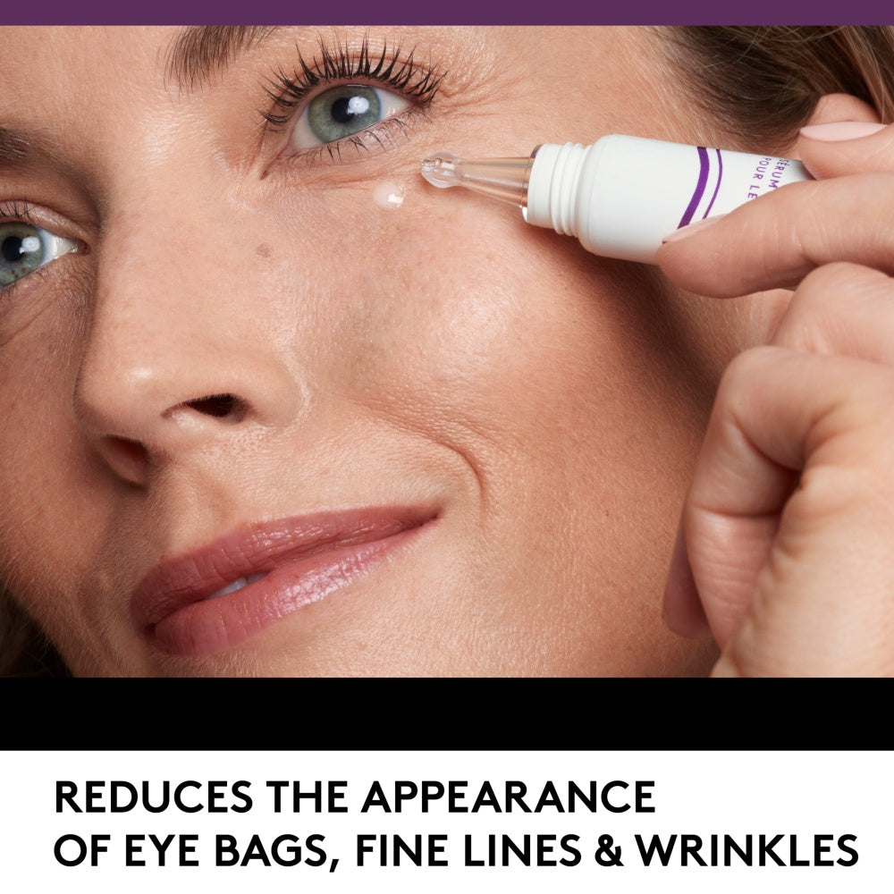 Model applying Simply Ageless Eye Lift Serum, reduces the appearance of eye bags, fine lines & wrinkles.