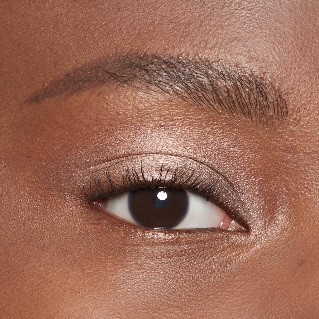Model showcasing Eye Enhancer Eyeshadow Mono in 780 Rose Beam.