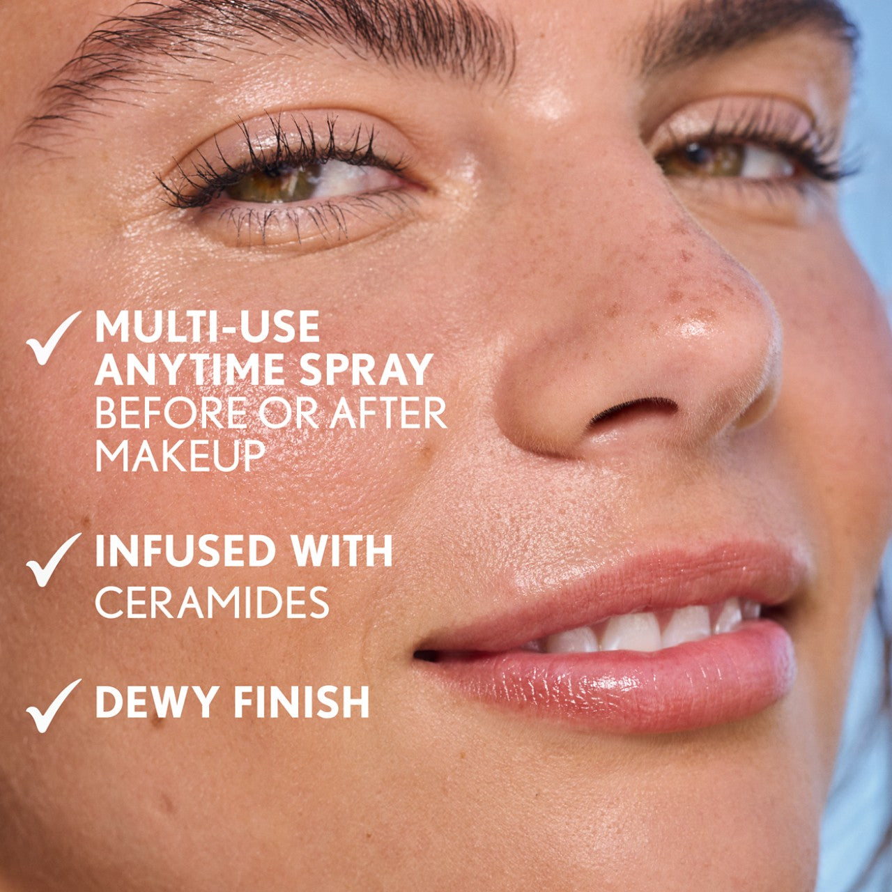Model with dewy skin, showcasing Clean Fresh Prime + Refresh Spray. Multi-use anytime spray. Infused with ceramides. Dewy finish.