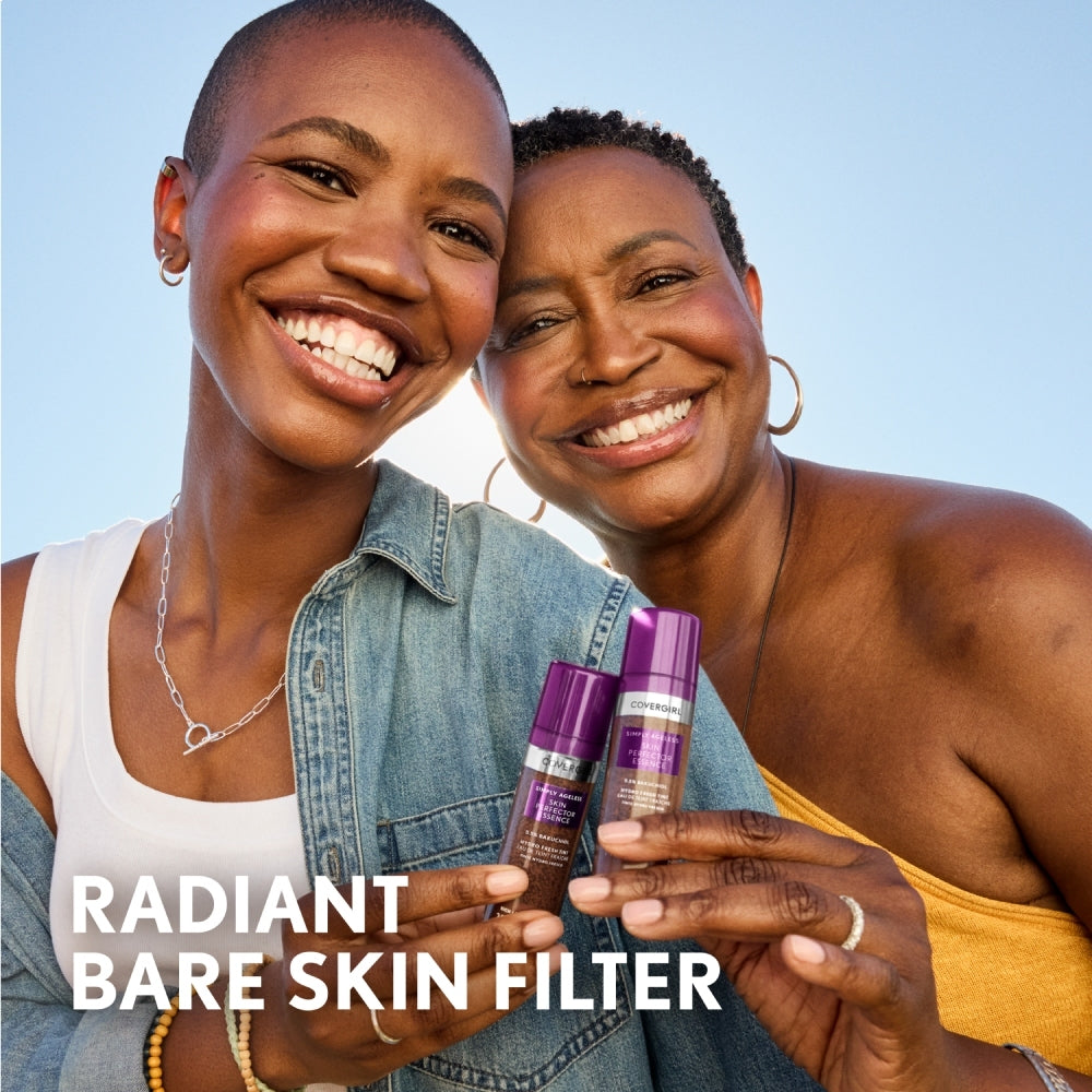 Two smiling model holding CoverGirl Simply Ageless Skin Perfector Essence bottles, promoting Radiant Bare Skin Filter.