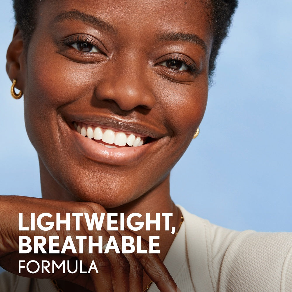 Model smiling with lightweight, breathable formula text.