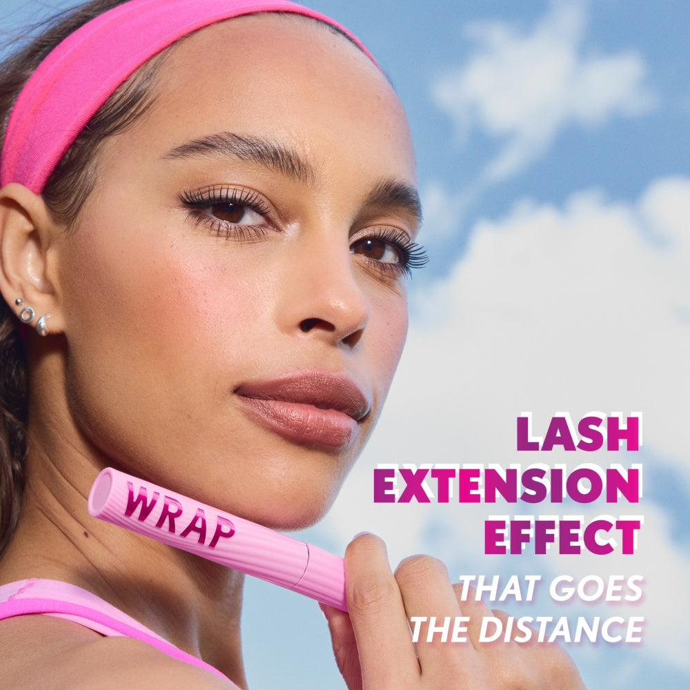 Model showcasing Eye Enhancer Wrap Tubing Mascara. Lash extension effect that goes the distance.
