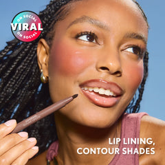 Model applying Outlast Lipstain in 38 Honey Sculpt.