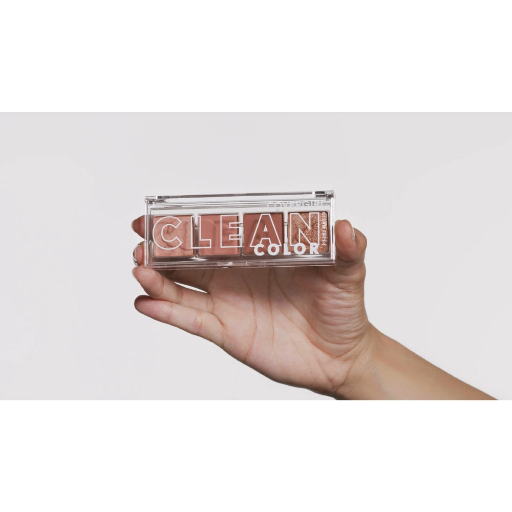 Model holding Clean Fresh Clean Color Eyeshadow in shade 212 - Shimmering Beige.
