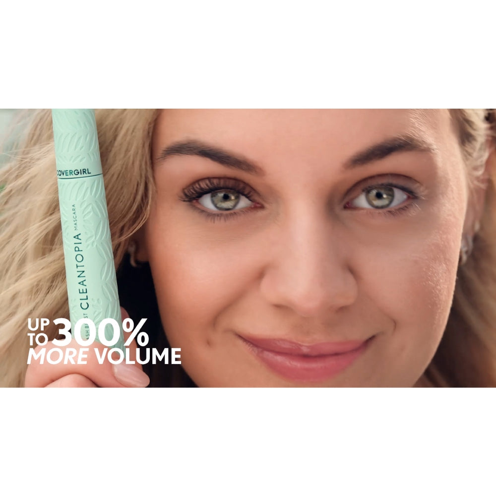 Model showcasing COVERGIRL Lash Blast Cleantopia Waterproof mascara with up to 300% more volume.